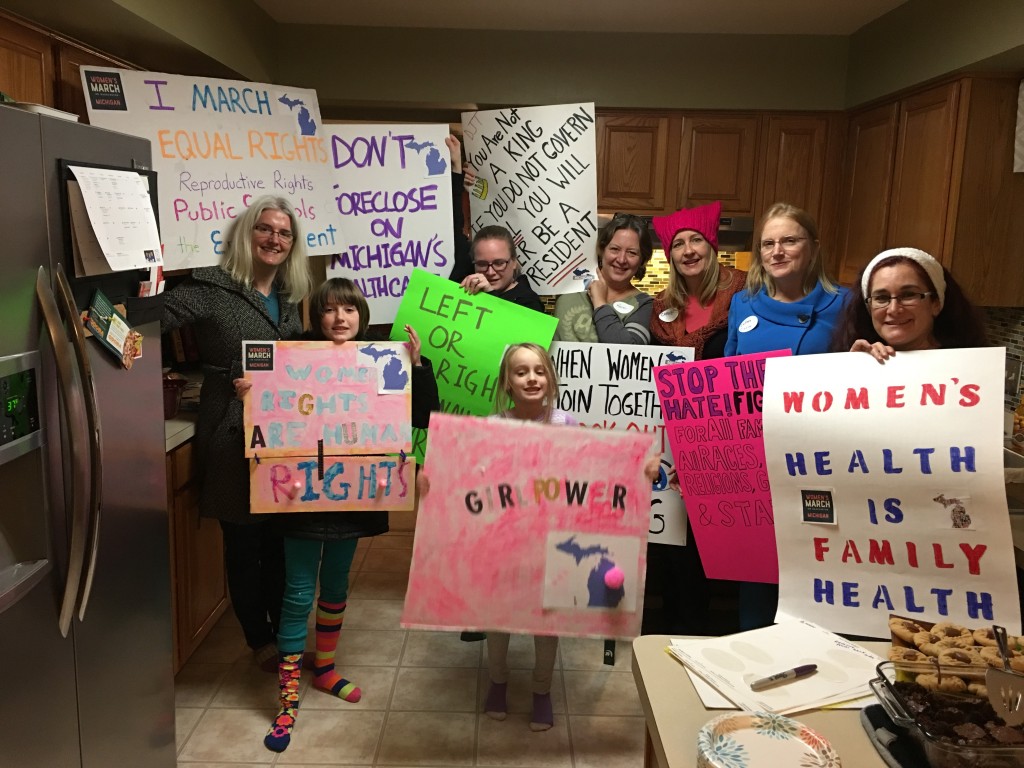 Making signs before the march. Photo courtesy of Colleen Crossey (www.colleencrossey.com).