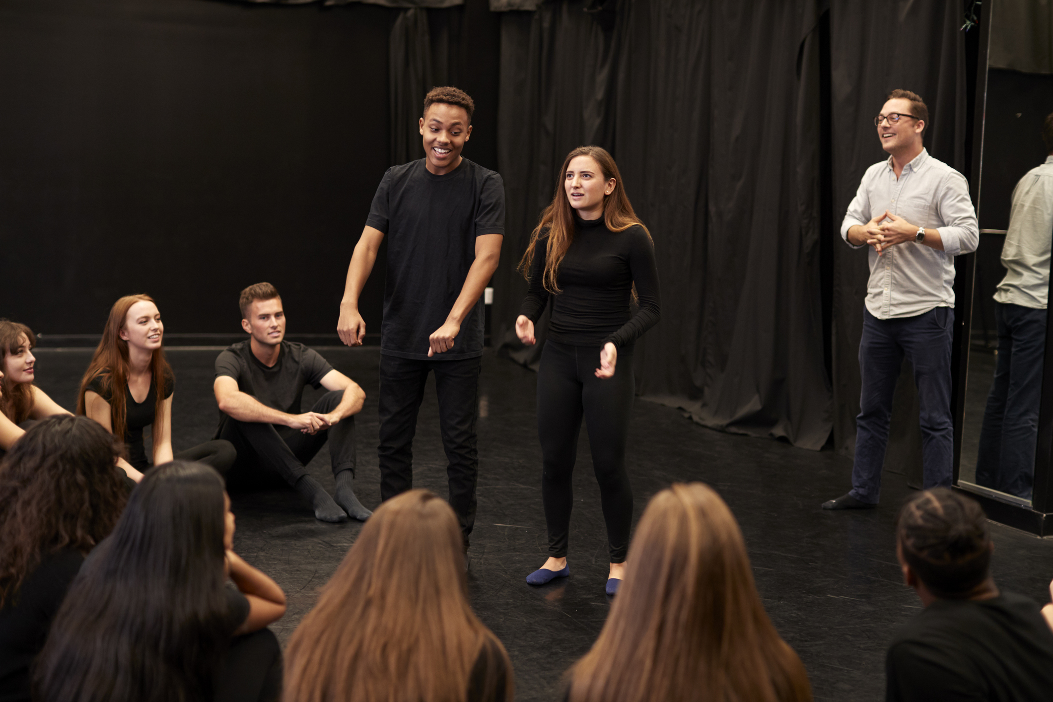 And Female Drama Students At Performing Arts School In Studio Improvisation Class